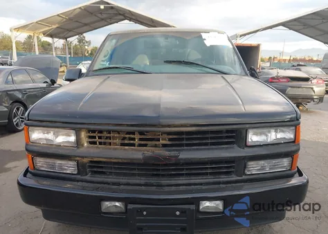 2000 Chevrolet Tahoe Limited from USA, damaged, VIN 1GNEC13R9YR229966